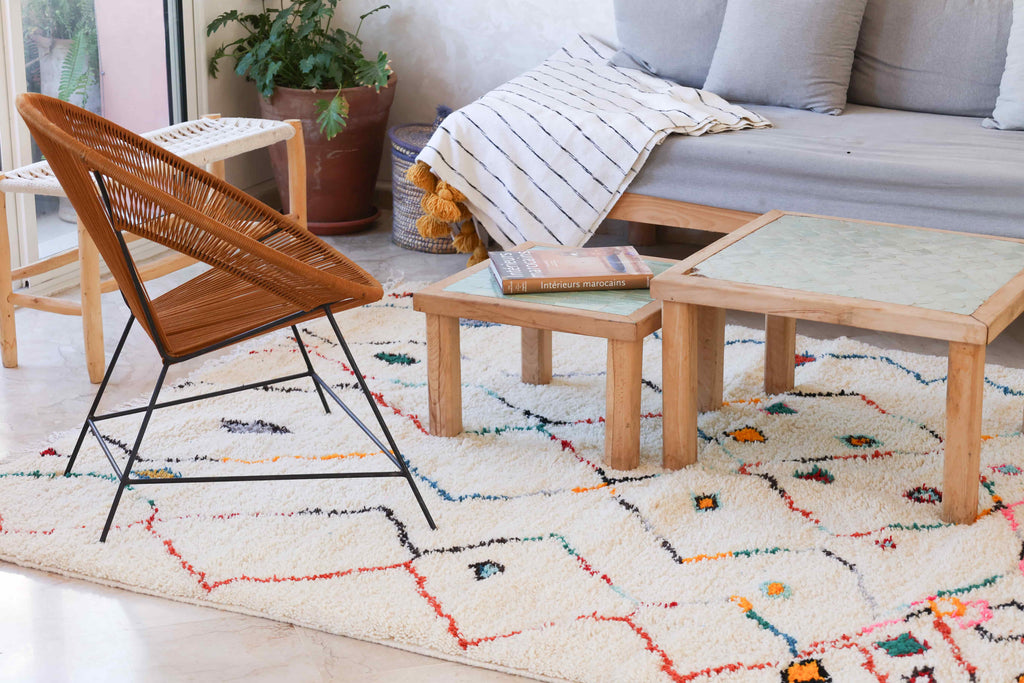 Comment créer un coin salon cosy avec un tapis berbere et quel style choisir ?