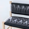 Bohemian bench in raw wood and natural weaving