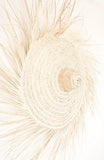Large round raffia wall mirror